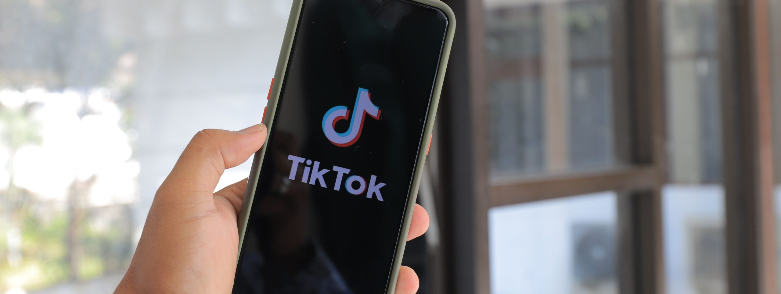 Tiktok logo on mobile phone